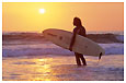 surfer and the setting sun